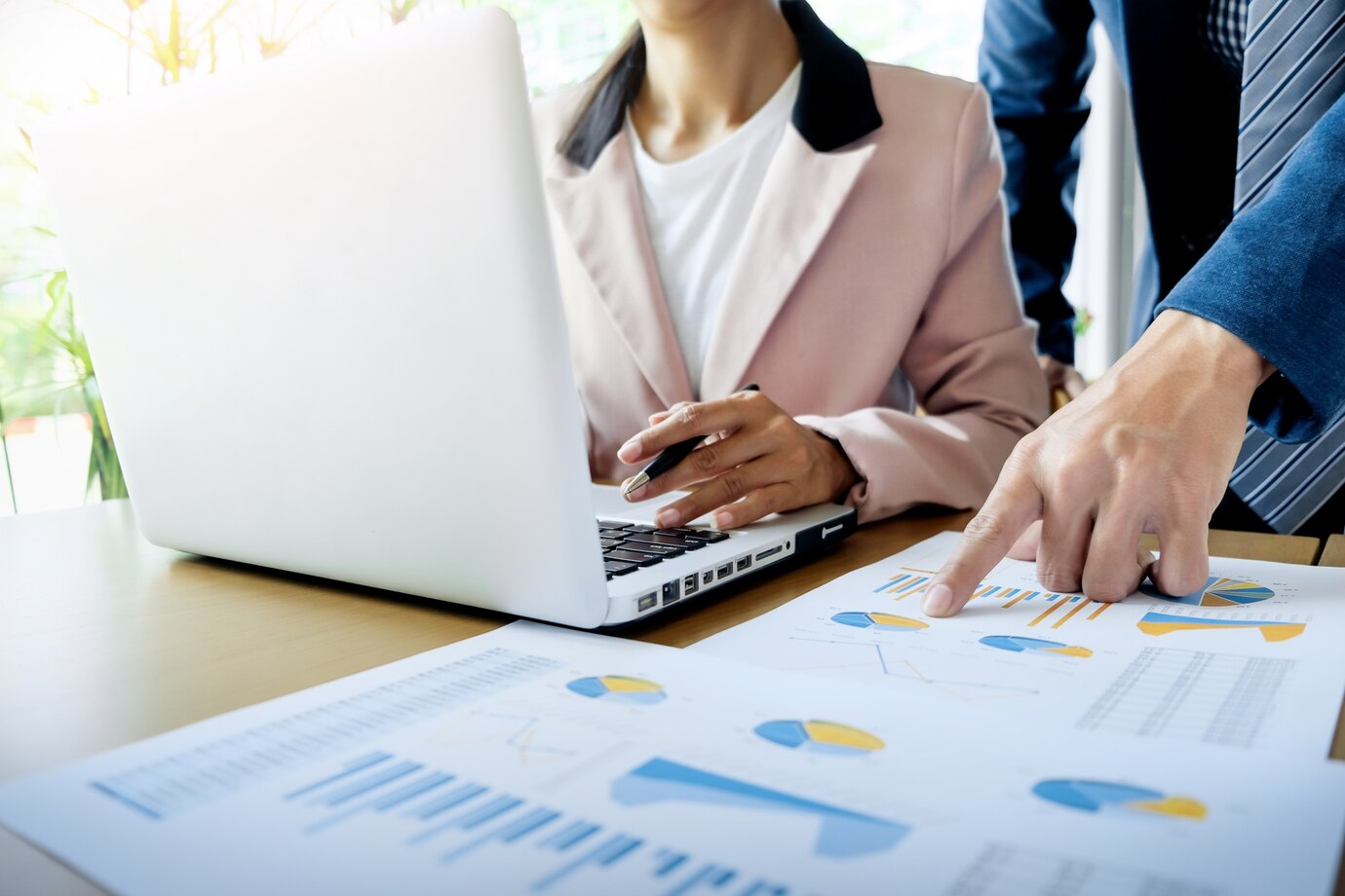 team-work-process-young-business-managers-crew-working-with-new-startup-project-laptop-wood-table-typing-keyboard-texting-message-analyse-graph-plans_1423-106.jpg